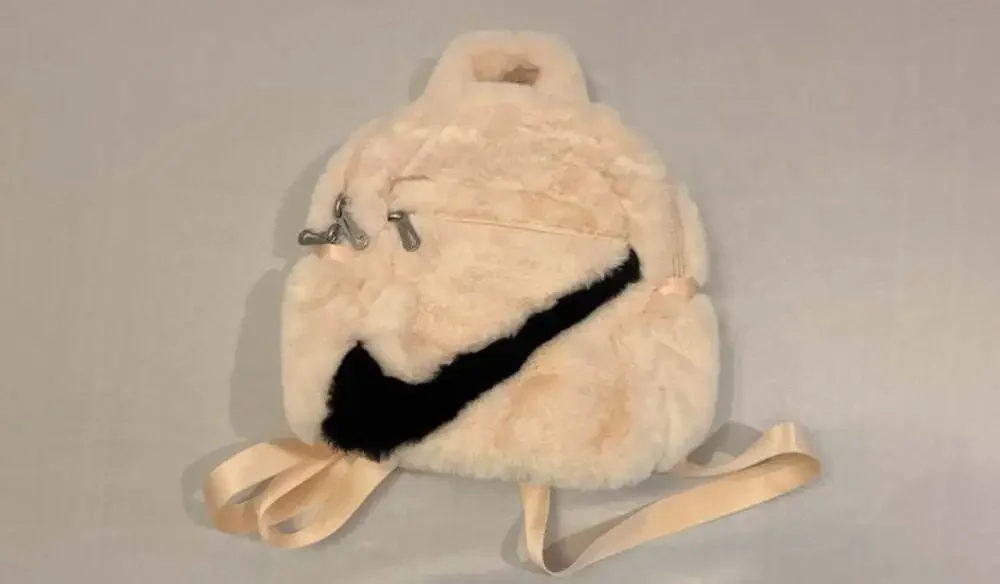 Nike 365 Faux Fur Mini Backpack in Peach/Cream with Black Swoosh